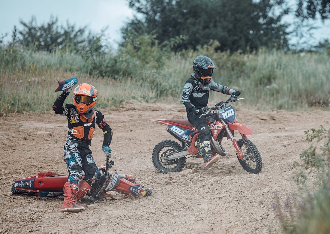 Young motocross riders during practice